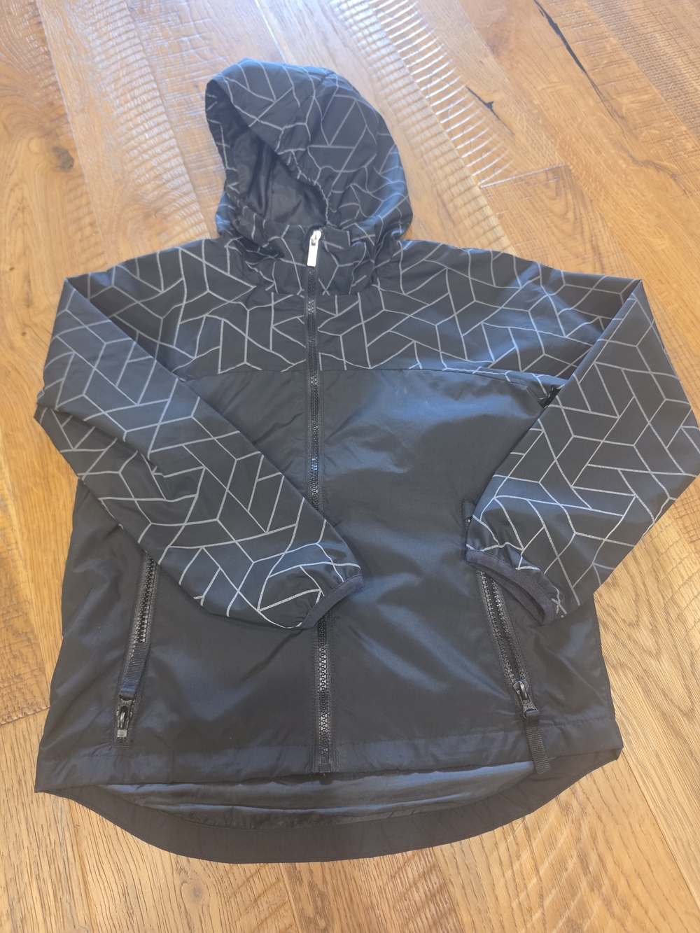 all in motion Black Hooded Windbreaker with Reflective Geometric Print